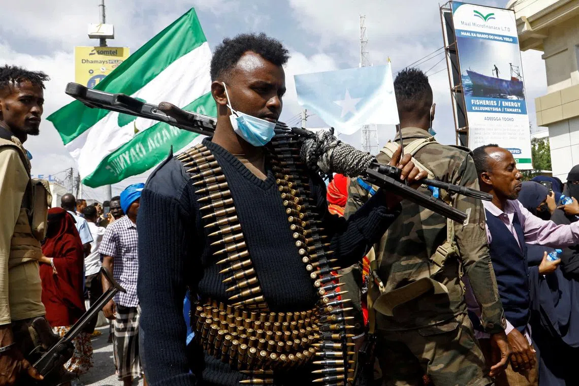 FILE PHOTO: A Somali police officers stands guard during a march against the Ethiopia-Somaliland port deal along KM4 street in Mogadishu, Somalia January 11, 2024. REUTERS/Feisal Omar/File Photo