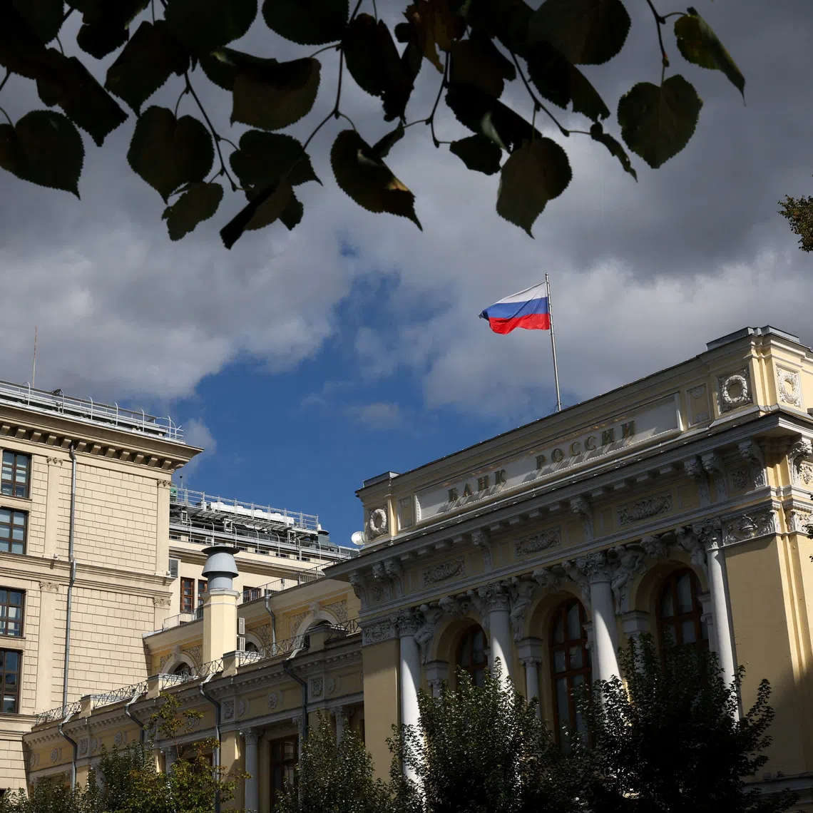 A flag flies above the headquarters of the Russian Central Bank on the day of a meeting, held to set its benchmark interest rate, in Moscow, Russia, September 12, 2025. REUTERS/Ramil Sitdikov