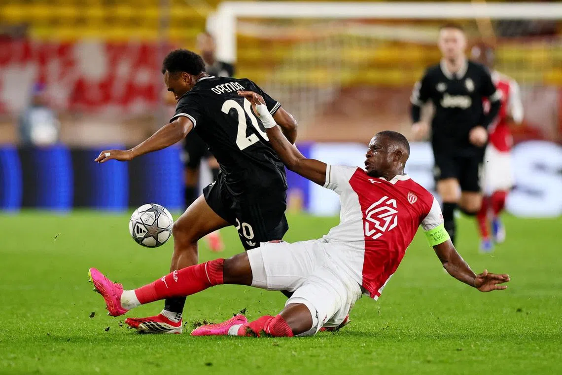 Soccer Football - UEFA Champions League - AS Monaco v Juventus - Stade Louis-II, Monaco - January 28, 2026  AS Monaco's Denis Zakaria in action with Juventus' Lois Openda REUTERS/Manon Cruz