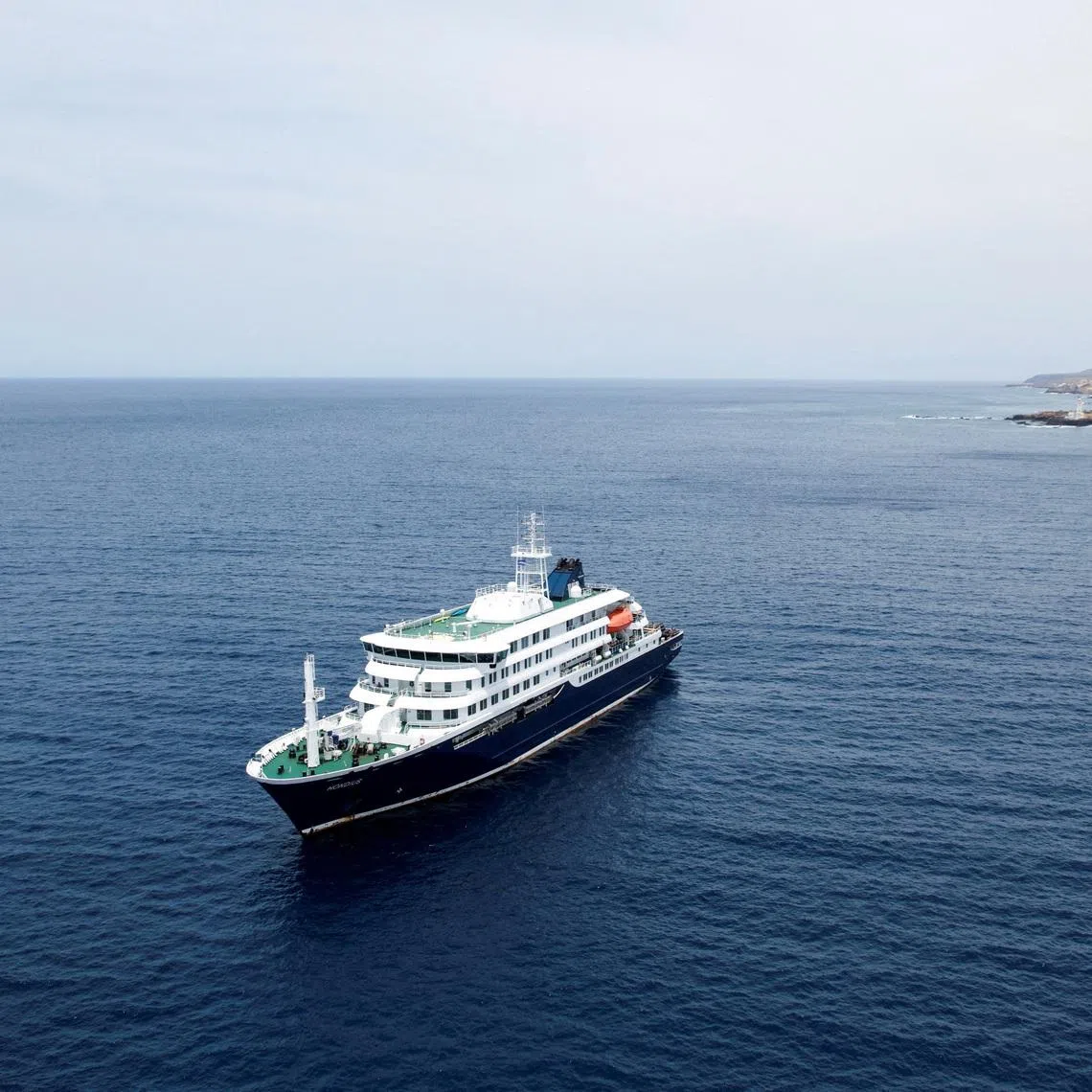 FILE PHOTO: A drone view of the cruise ship MV Hondius, carrying passengers suspected of having cases of hantavirus on board, as it prepares to leave Praia, Cape Verde, May 6, 2026. REUTERS/Danilson Sequeira/File Photo