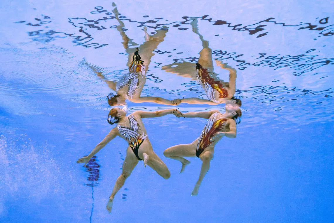 Britain's Kate Shortman and Isabelle Thorpe competing in the preliminary round of the women's duet free Group B artistic swimming event during the 2024 World Aquatics Championships at Aspire Dome in Doha on Feb 7, 2024. 