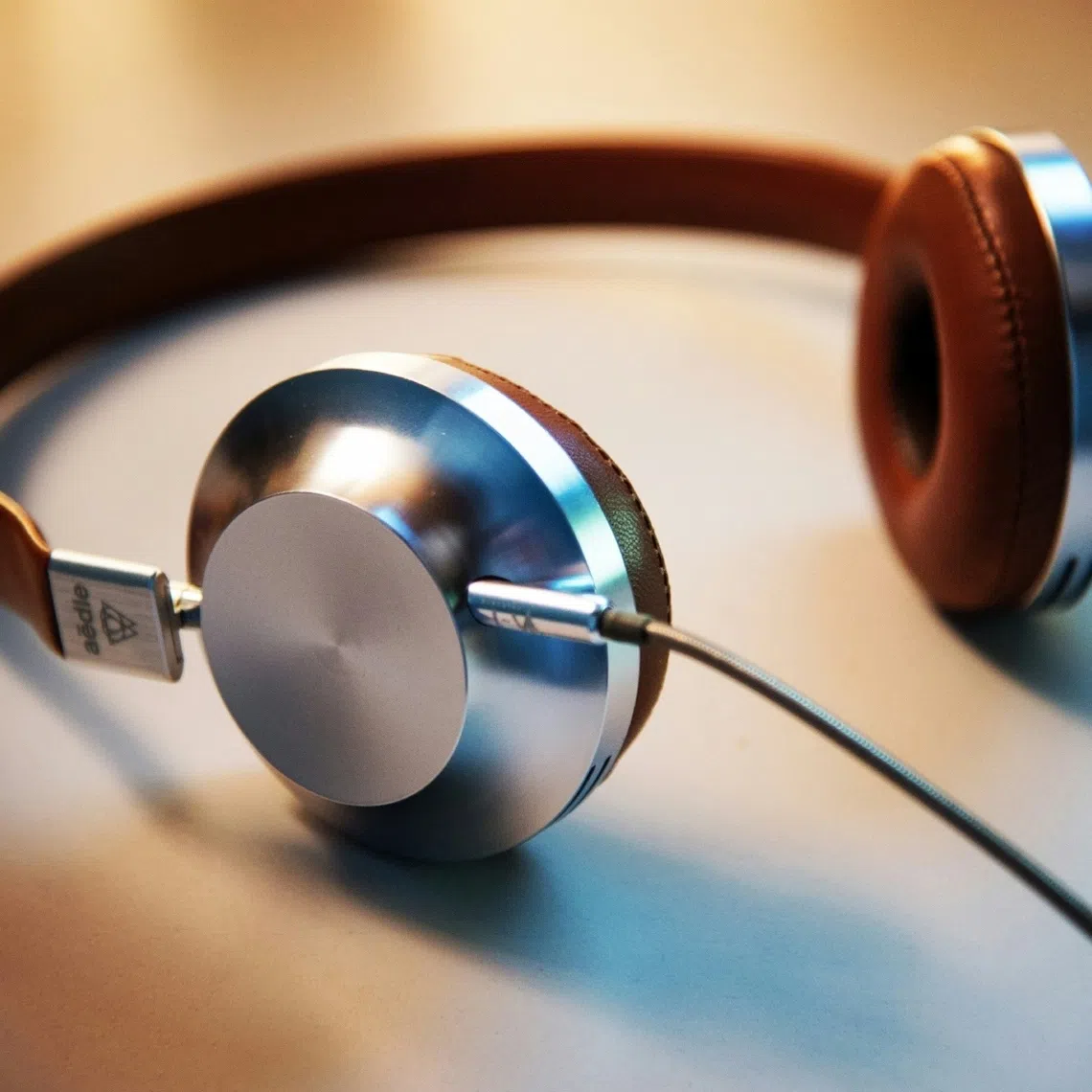 Record companies and music publishers have said the company has violated copyright on a massive scale by using millions of songs without their permission.