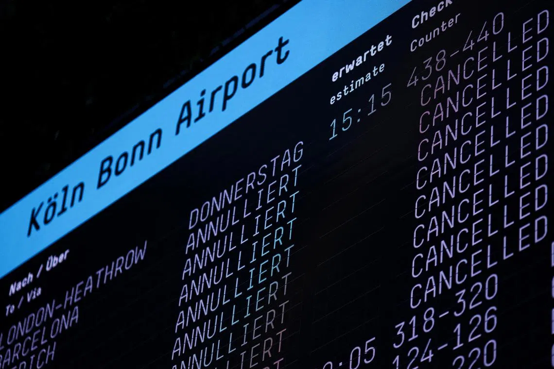 A display showing cancelled flights at the Cologne-Bonn airport in Cologne, Germany.