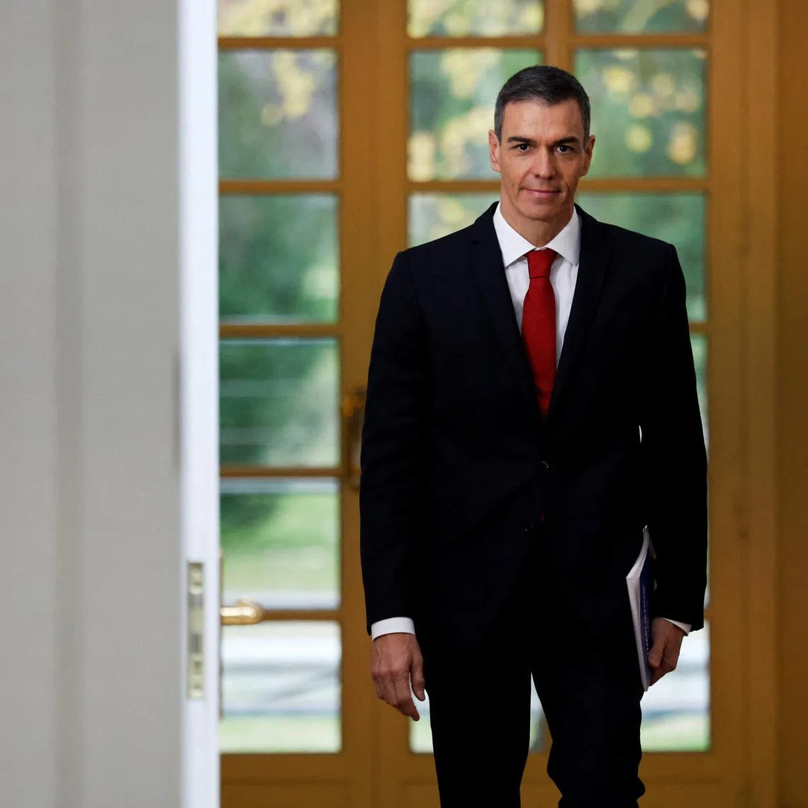 Spain's Prime Minister Pedro Sanchez arrives for a year-end balance news briefing at Moncloa Palace in Madrid, Spain, December 15, 2025. REUTERS/Susana Vera