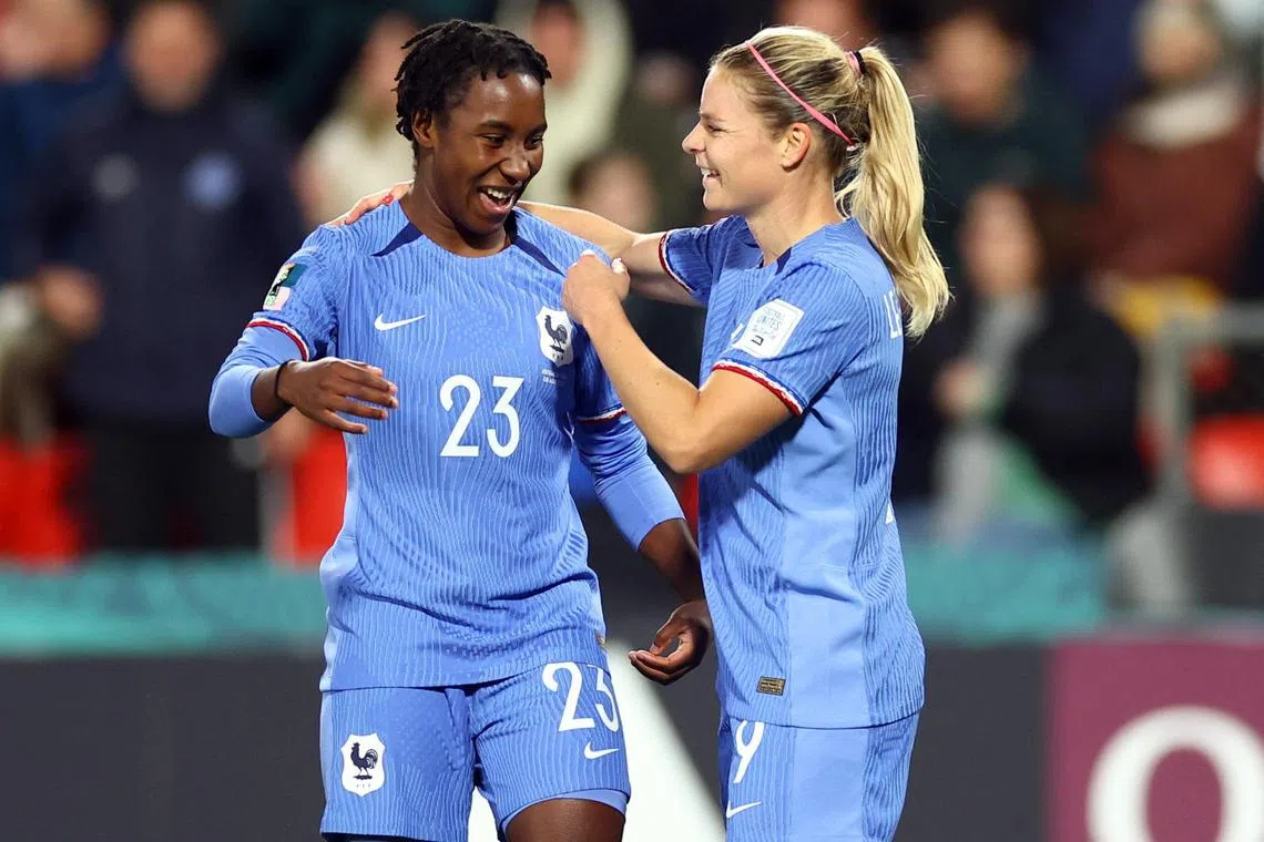 Eugenie Le Sommer (right) celebrating with Vicki Becho after scoring France's fourth goal and her second in their 4-0 Women's World Cup last-16 win over Morocco at Hindmarsh Stadium, Adelaide, on Tuesday.
