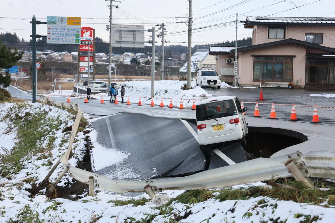 51 hurt in Japan quake as warning persists