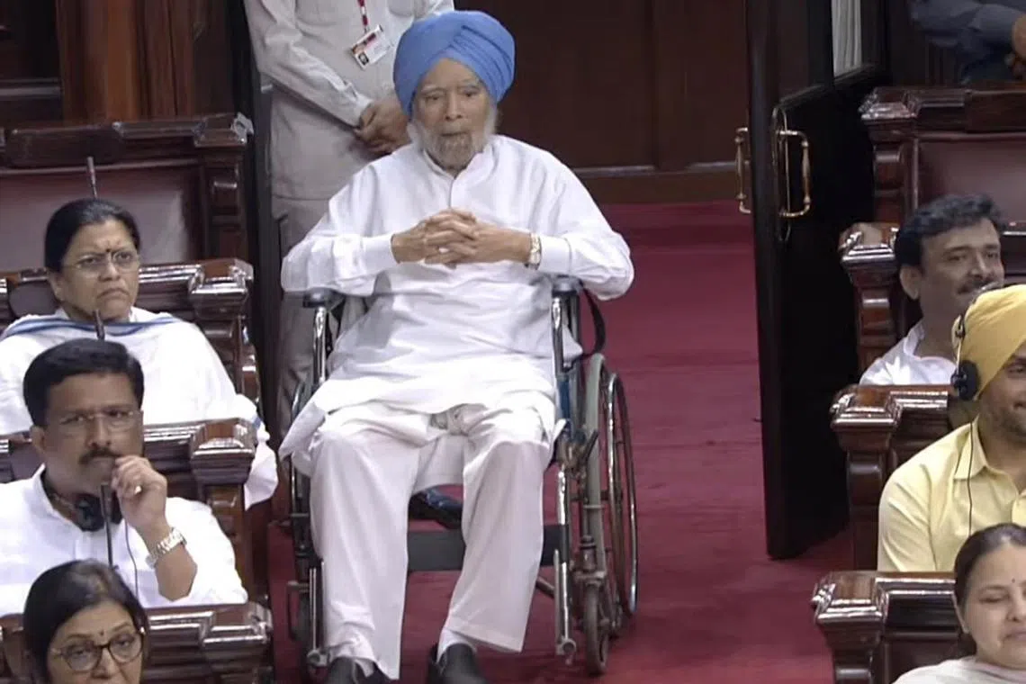 Former prime minister Dr Manmohan Singh in a wheelchair in Parliament.