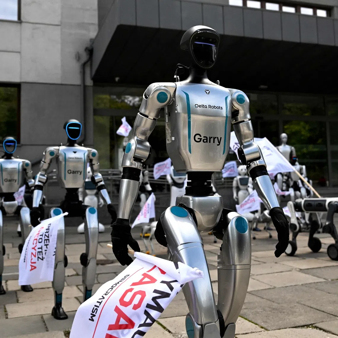 Robots, ranging from bipedal humanoids to dog-like quadripeds, are seen at a demonstration calling for AI regulation in front of the Polish digital affairs ministry in Warsaw on Sept 7, 2026.