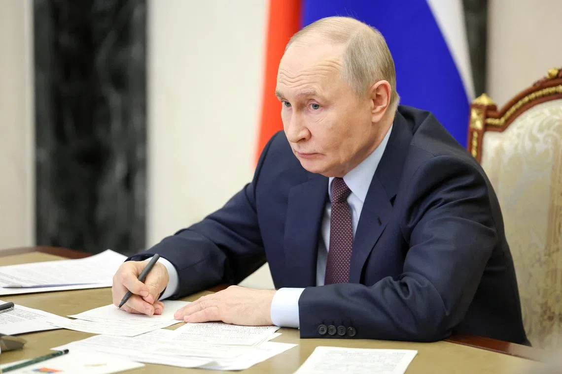 Russian President Vladimir Putin chairs a meeting with members of the government via video link at the Kremlin in Moscow, Russia, April 23, 2026. Sputnik/Alexander Kazakov/Pool via REUTERS/File Photo