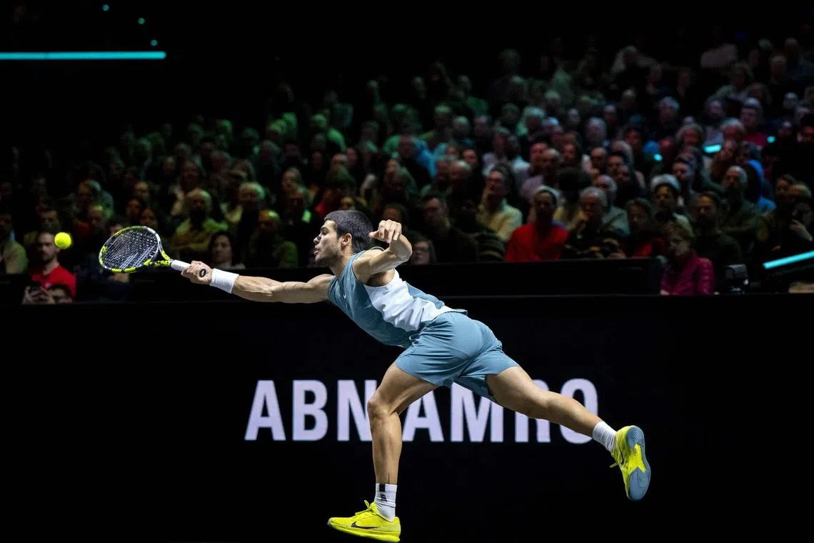 Spain's Carlos Alcaraz plays a forehand return against Italy's Andrea Vavassori in their clash at the Rotterdam Open.