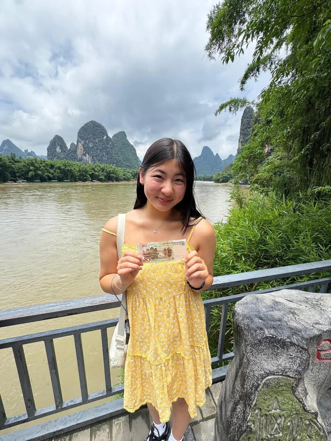 Beverly Cheung, a student from Utah, at a lake in Guilin in June 2025.