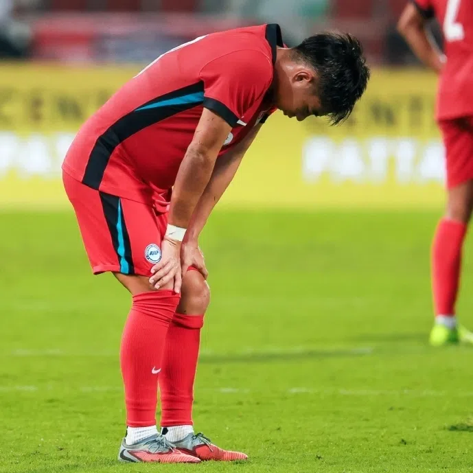 Loh Kean Yew (left) lost in the SEA Games quarter-finals to Indonesia's Zaki Ubaidillah while Singapore's Under-22 players lost 3-0 loss Thailand.