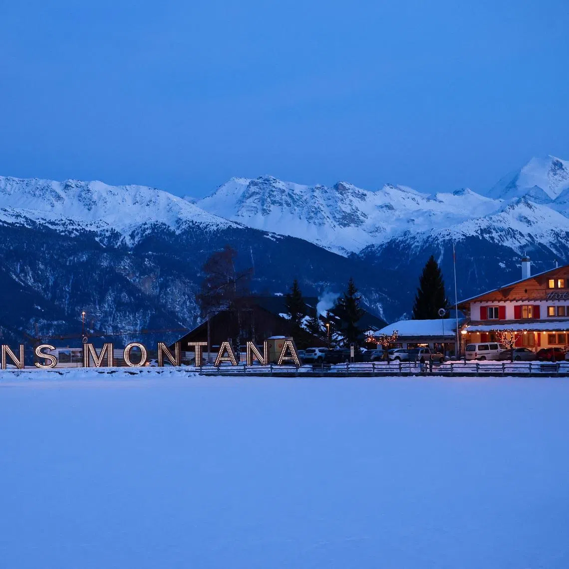 Letters forming the name Crans‑Montana are illuminated almost a month after a deadly fire during a New Year’s Eve party at the \"Le Constellation\" bar in the upscale ski resort of Crans‑Montana, Switzerland, January 31, 2026. REUTERS/Denis Balibouse