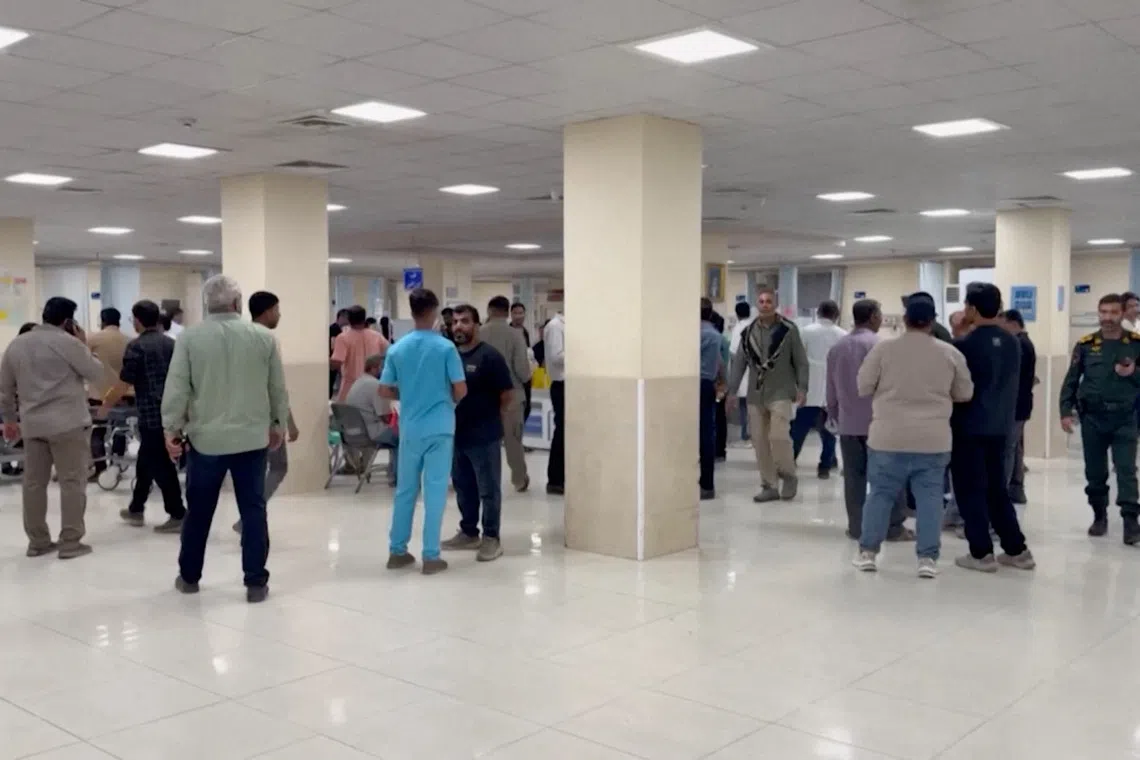 People wait at a hospital lobby following an attack at a wedding near Sirik, a coastal area on the Strait of Hormuz, the Iranian Red Crescent reported, as the United States and Iran engaged in the most significant exchange of fire in weeks, in Sirik, Hormozgan province, Iran, September 2, 2026, in this screen grab taken from a handout video. WANA (West Asia News Agency) via REUTERS