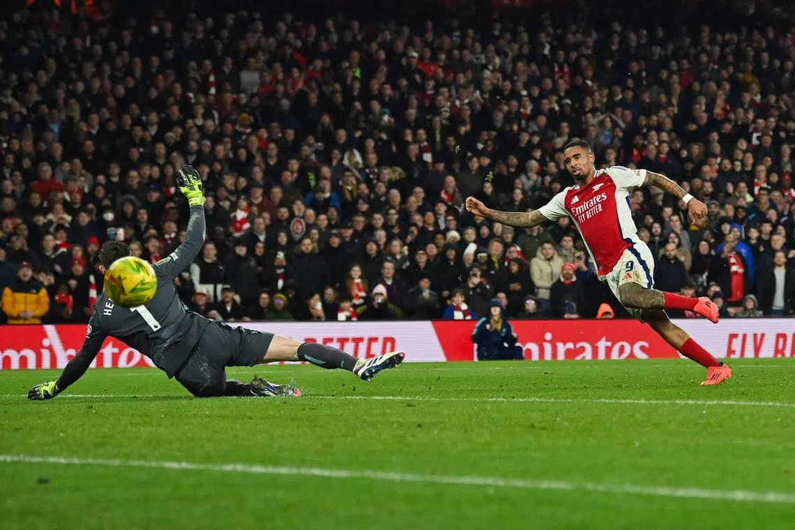 Arsenal's Gabriel Jesus shoots the ball past Crystal Palace's Dean Henderson for the third goal in the 3-2 League Cup win at the Emirates.
