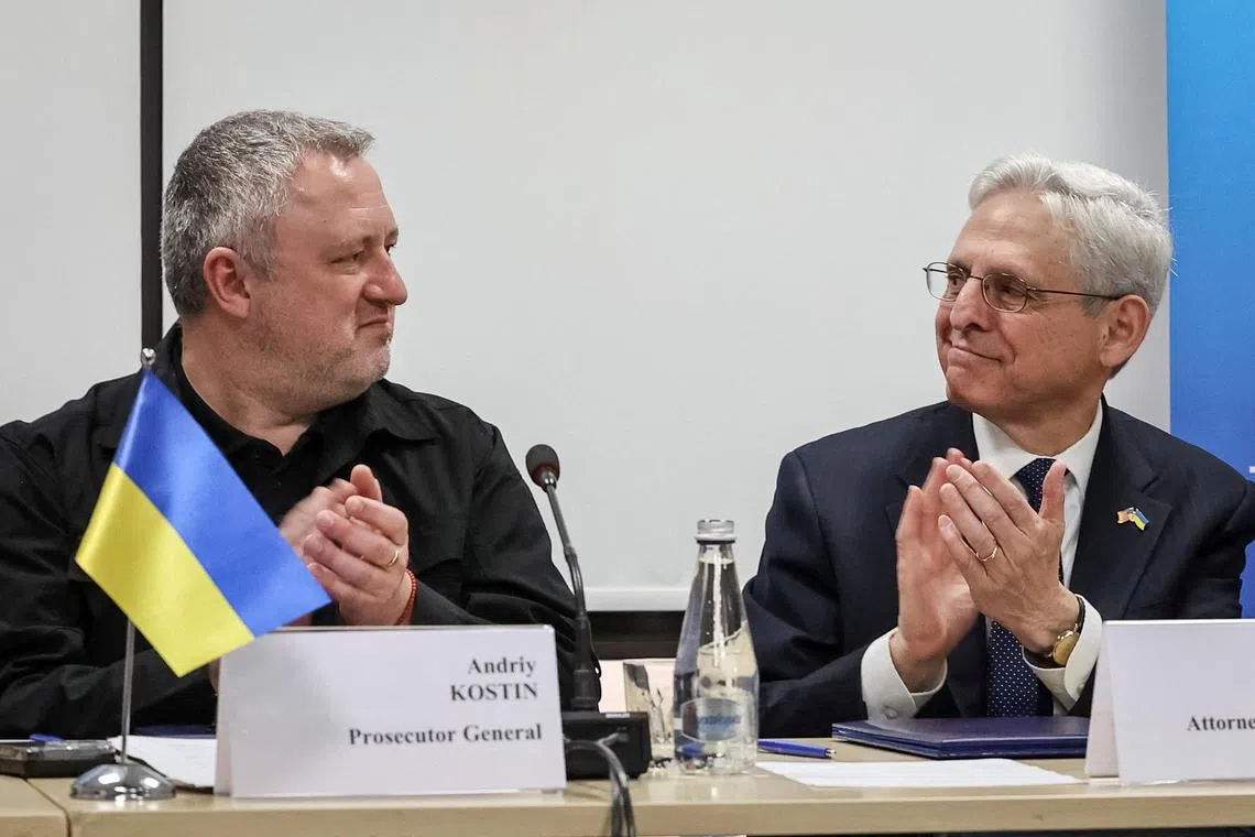 Ukrainian Prosecutor-General Andriy Kostin (left) and US Attorney-General Merrick Garland at a conference in Lviv on justice and war crimes.