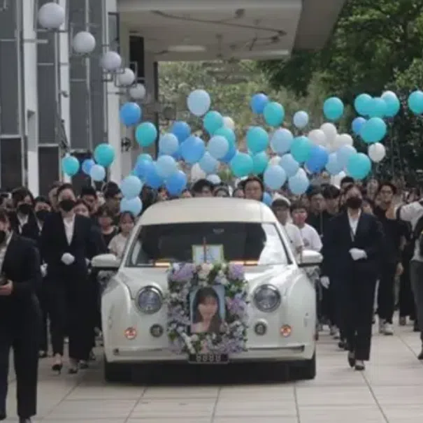 Blue and white balloons were released into the sky in memory of 16-year-old Yap Shing Xuen during her funeral on Oct 20.