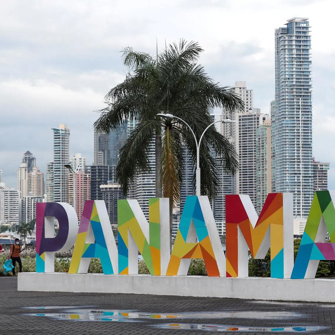 FILE PHOTO: A Panama sign is seen at a photographic parador with the skyline of the city in the background, in Panama City, Panama October 4, 2021. REUTERS/Erick Marciscano/File Photo