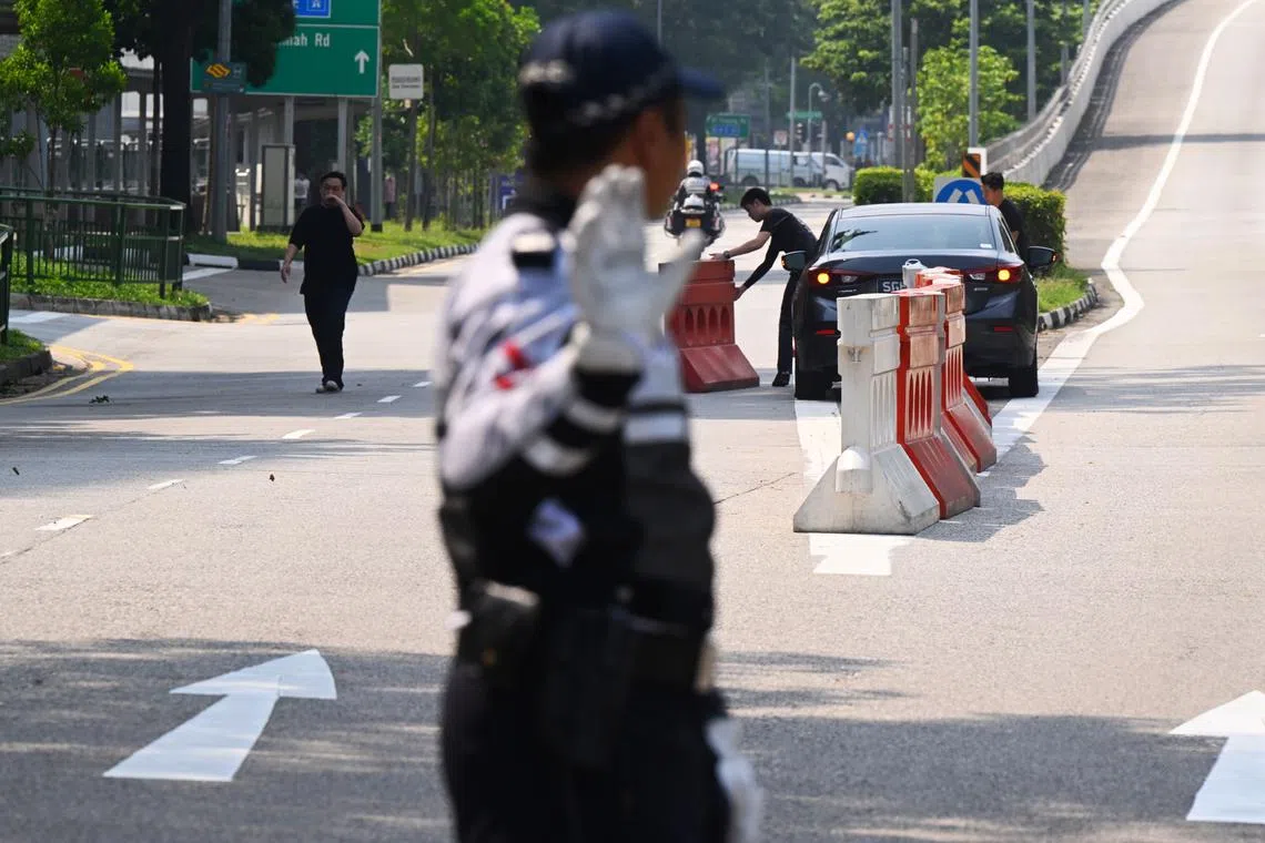Road closure set up at the start of the Bukit Panjang flyover at Woodlands Road at 11am on September 26. 