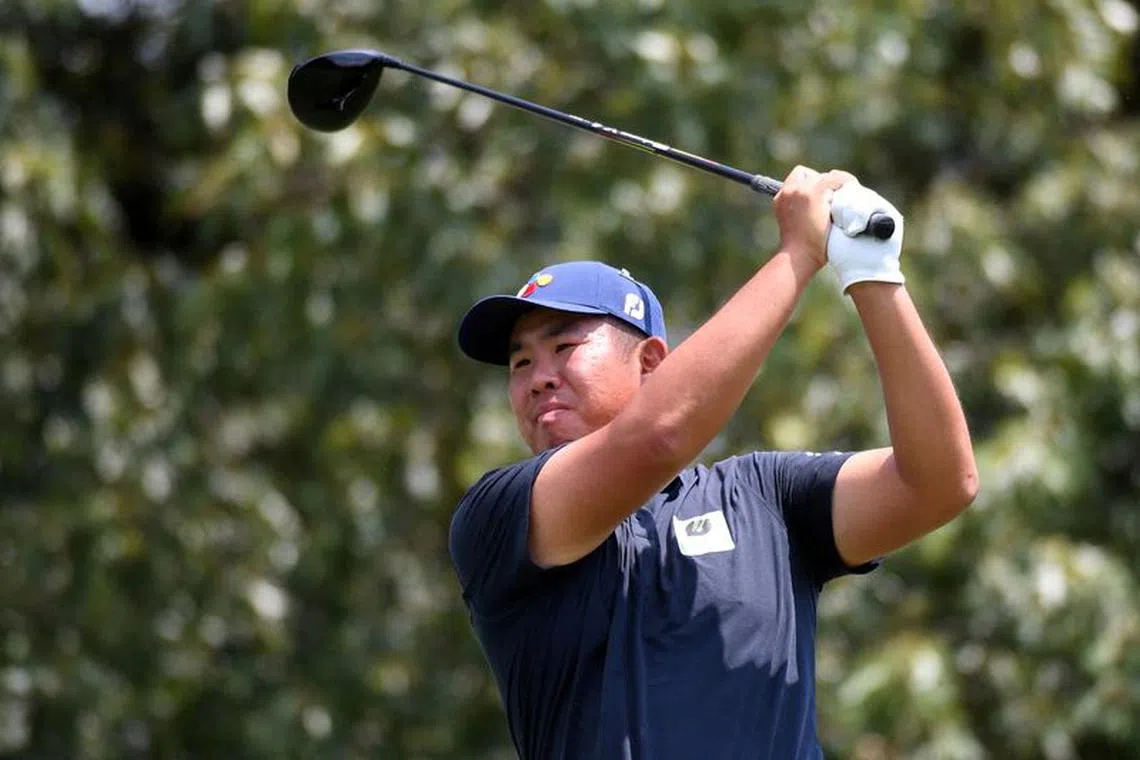 FILE PHOTO: Aug 11, 2023; Memphis, Tennessee, USA; Byeong Hun An watches his tee shot on the 17th hole during the second round of the FedEx St. Jude Championship golf tournament. Mandatory Credit: Christopher Hanewinckel-USA TODAY Sports/File Photo