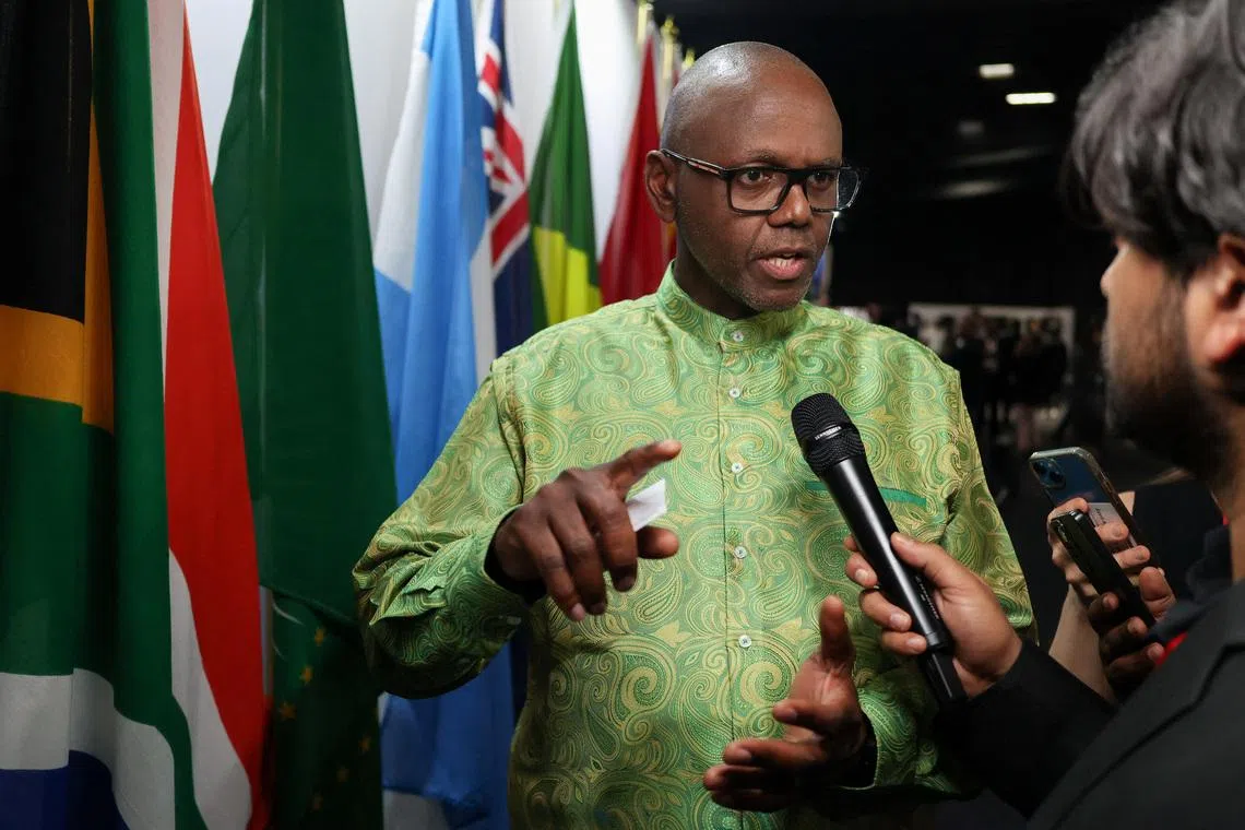 Vincent Magwenya, Spokesperson to South African President Cyril Ramaphosa answers questions from journalists on the sidelines, on the opening day of the G20 Leaders' Summit at the Nasrec Expo Center in Johannesburg, South Africa, November 22, 2025. REUTERS/Siphiwe Sibeko/File Photo