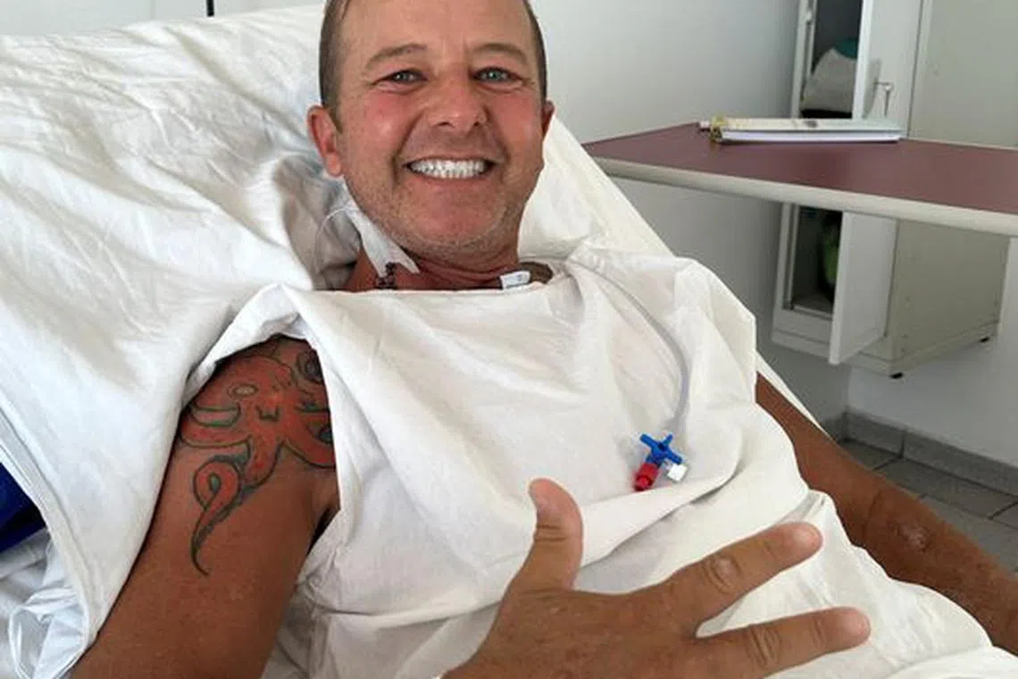 Patient Ricardo Medeiros de Oliveira reacts after a kidney transplant at the hospital Santa Casa de Juiz de Fora, state of Minas Gerais, Brazil September 25, 2023. REUTERS/Michelle Cafiero