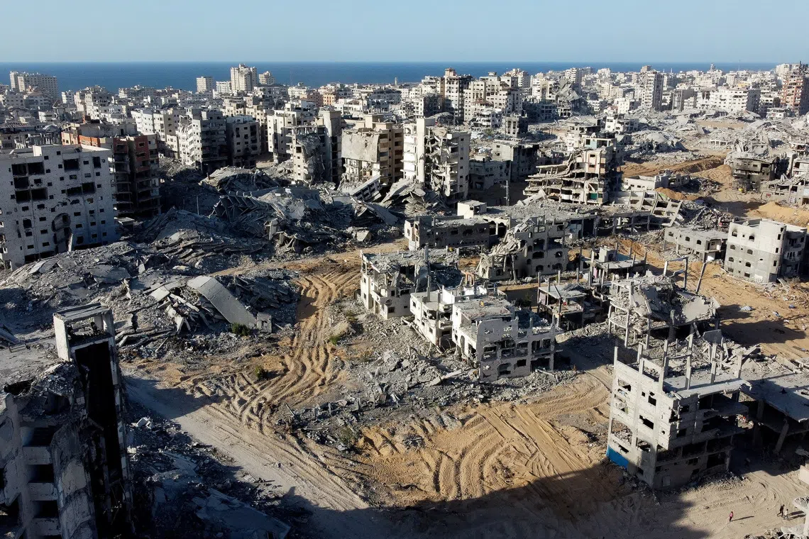 A drone view shows the destruction in a residential neighborhood, after the withdrawal of the Israeli forces from the area, amid a ceasefire between Israel and Hamas in Gaza, in Gaza City, October 21, 2025. REUTERS/Dawoud Abu Alkas