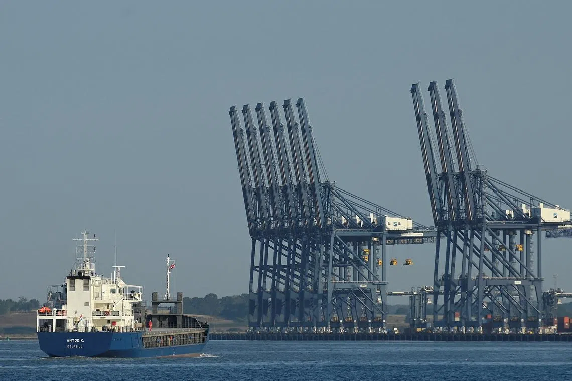 FILE PHOTO: An empty cargo ship approaches UK's biggest container port Felixstowe, Britain, August 22, 2022. REUTERS/Toby Melville/ File Photo
