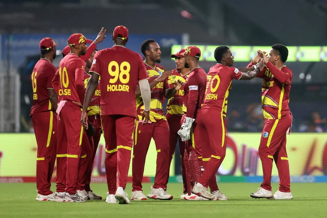 FILE PHOTO: Cricket - ICC Men's T20 World Cup 2026 - Super 8 - India v West Indies - Eden Gardens, Kolkata, India - March 1, 2026 West Indies' Sherfane Rutherford celebrates with teammates after catching out India's Suryakumar Yadav off the bowling of West Indies' Shamar Joseph. REUTERS/Sahiba Chawdhary/File Photo