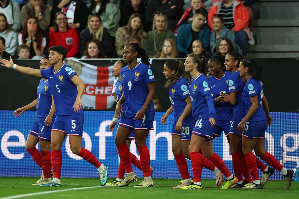Soccer Football - Women's Euro 2025 Qualifier - England v France - St James' Park, Newcastle, Britain - May 31, 2024 France's Marie-Antoinette Katoto celebrates scoring their second goal with teammates REUTERS/Phil Noble