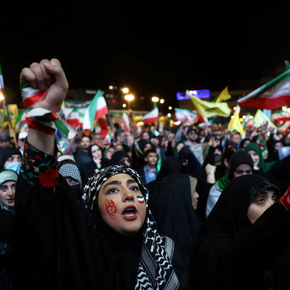 People chant during a rally in Tehran, Iran, May 6, 2026. Majid Asgaripour/WANA (West Asia News Agency) via REUTERS