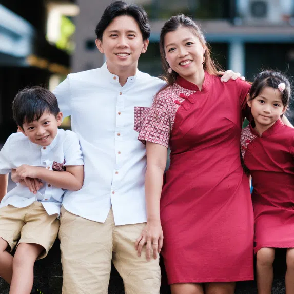Family wearing matching clothes set for Chinese New Year