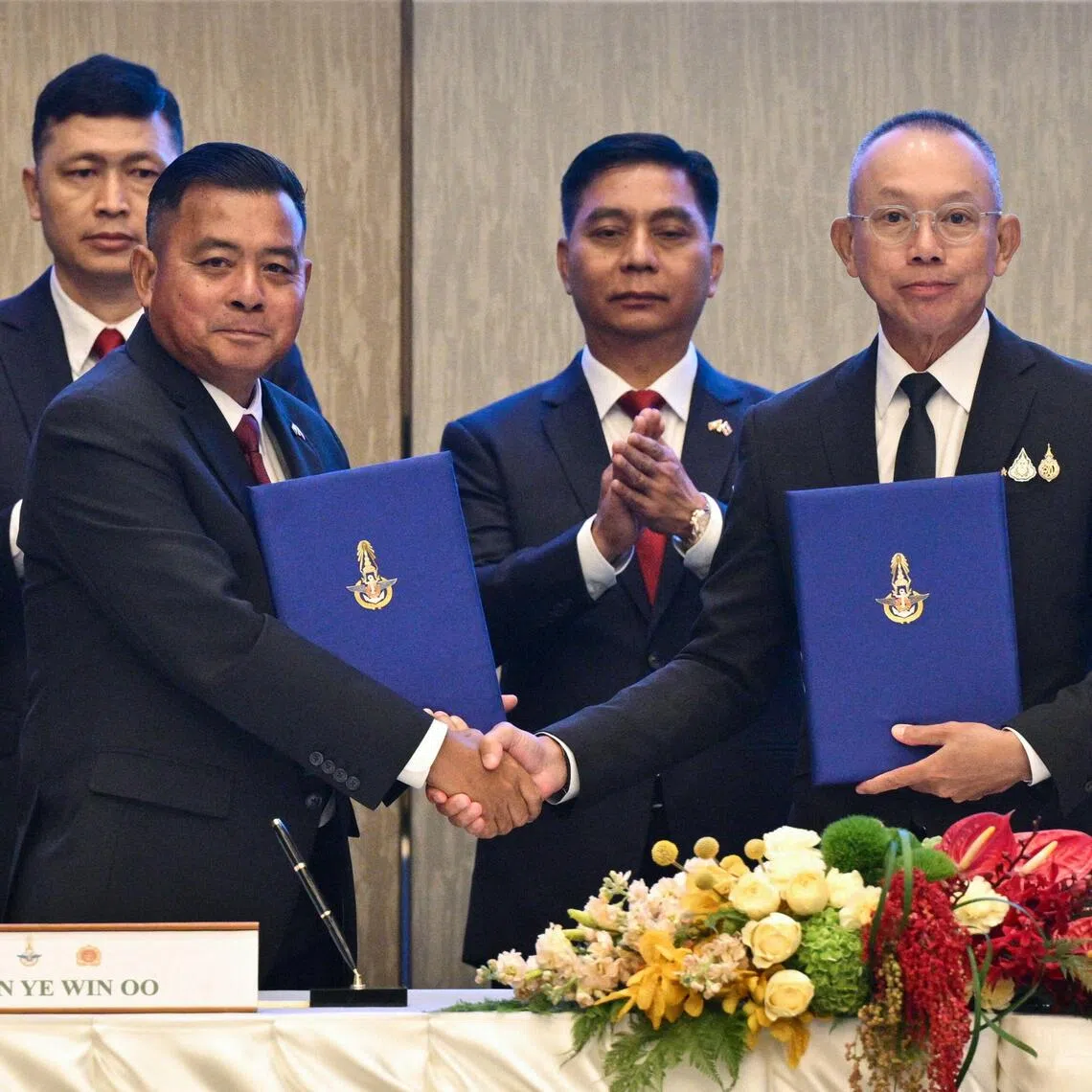 Myanmar’s military commander-in-chief, General Ye Win Oo (left), and Thailand’s Chief of Defence Forces, Ukrit Boontanon, shaking hands after their talks in Bangkok on Aug 20.