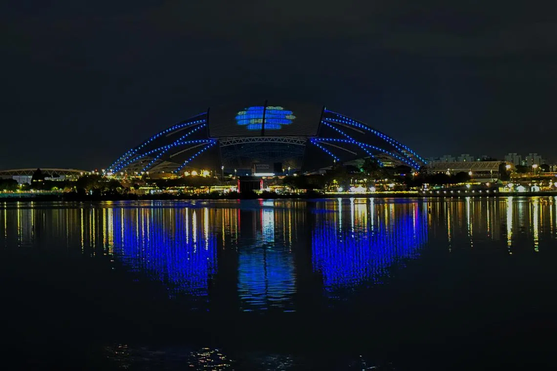 An artist's impression of the National Stadium in the colours of the World Aquatics logo. The stadium at the Singapore Sports Hub will host the World Aquatics Championships in 2025. 
