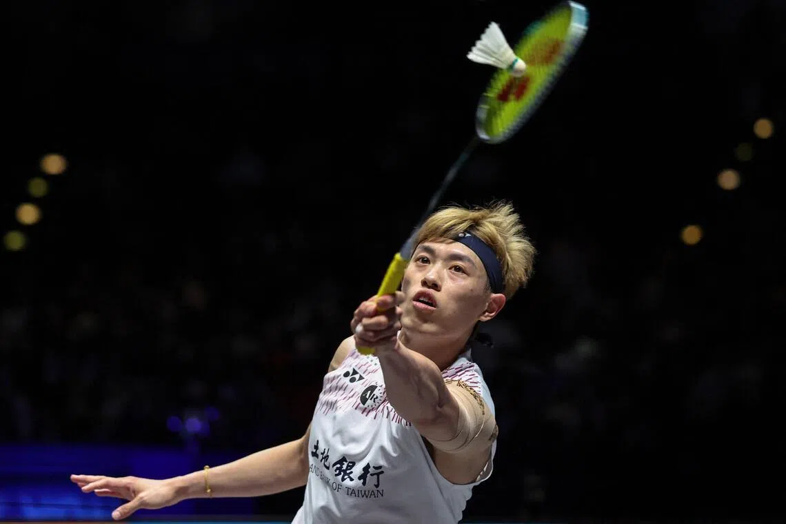 Chinese Taipei's Lin Chun-yi hits a return against India's Lakshya Sen during their singles final at the All England Open at the Utilita Arena in Birmingham.