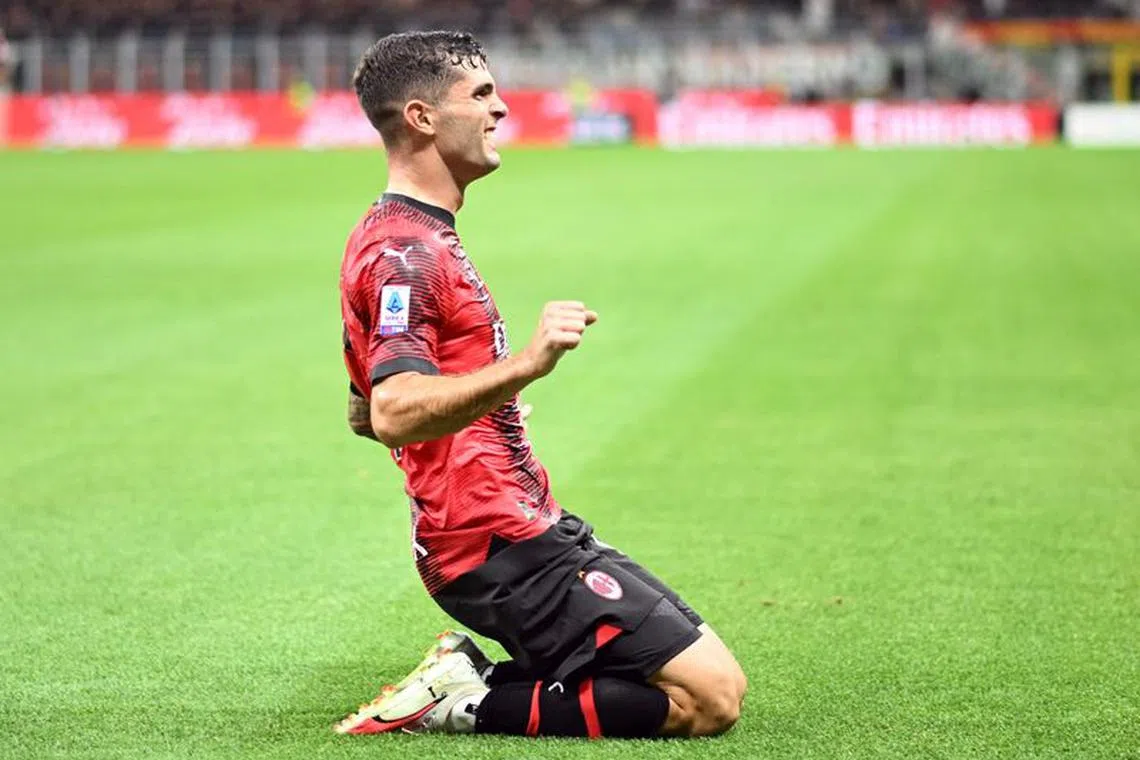 Soccer Football - Serie A - AC Milan v Torino - San Siro, Milan, Italy - August 26, 2023 AC Milan's Christian Pulisic celebrates scoring their first goal REUTERS/Daniele Mascolo