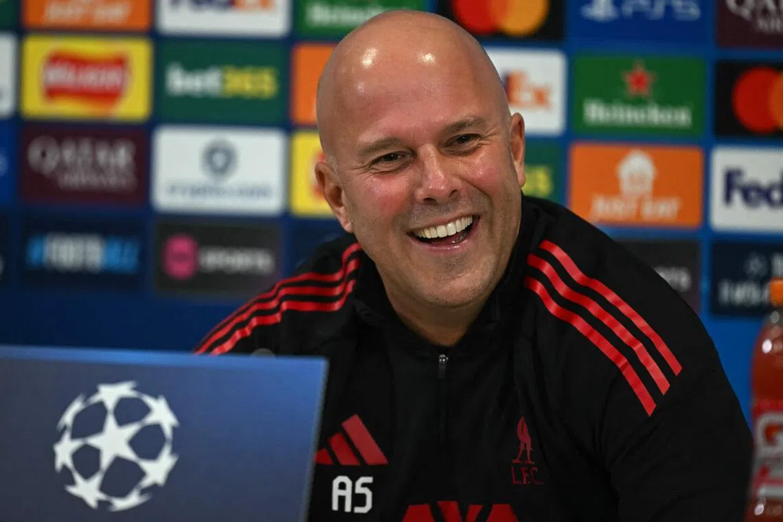 Despite Liverpool's horrible domestic form, their Dutch manager Arne Slot is all smiles during a press conference at Anfield on Nov 25, 2025, on the eve of their UEFA Champions League match against PSV Eindhoven.