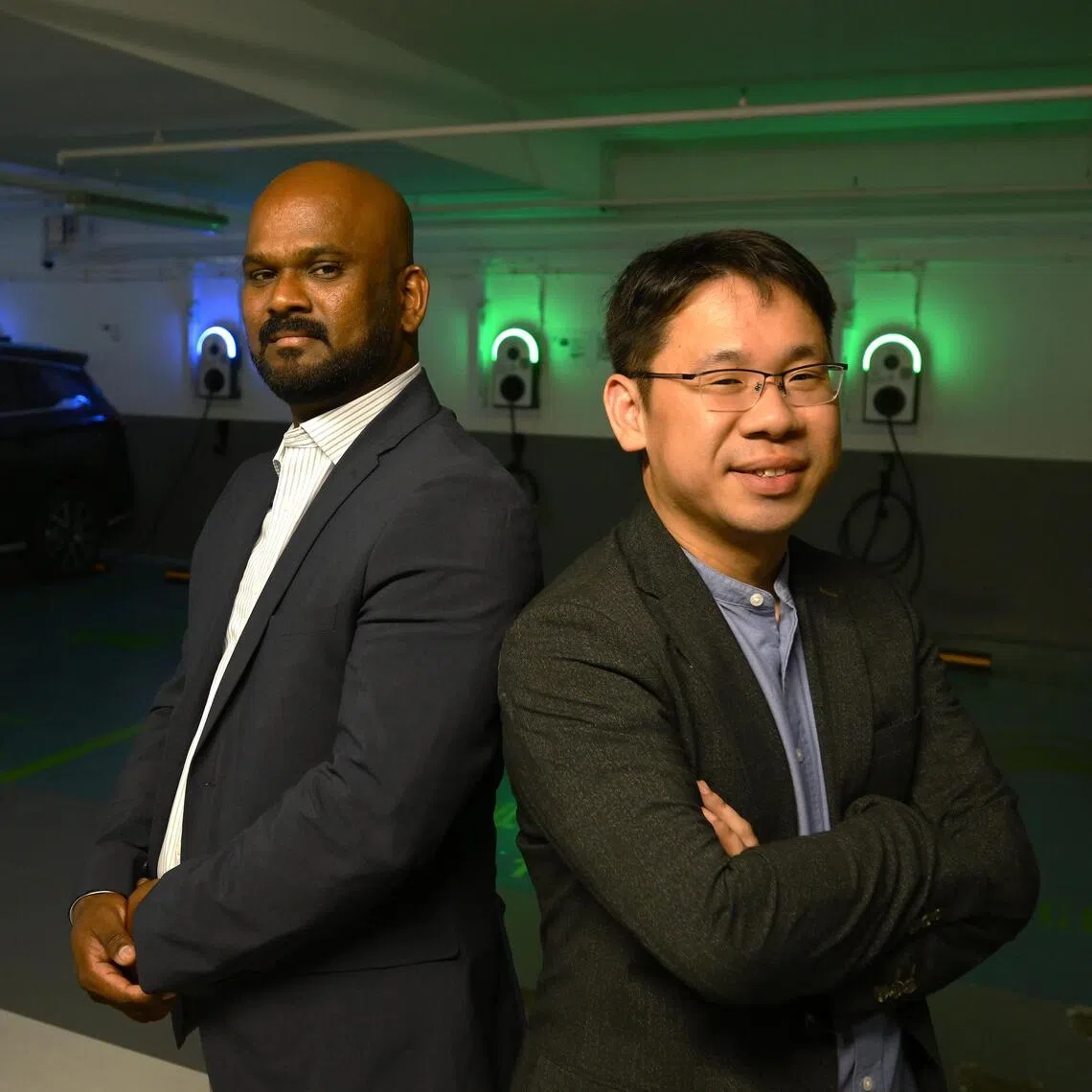 Sathiyamoorthy Nagarajan (left), a power systems specialist from India, partnered with Singaporean engineer Lai Yuan Weng to set up MNL Solutions, which delivers sustainable EV charging solutions for homes, condos, commercial and industrial sites.
