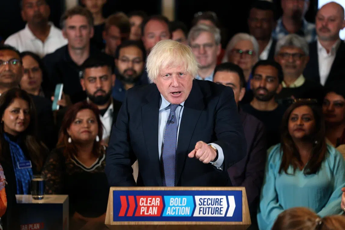 Former British prime minister Boris Johnson campaigning at a Conservative Party election event in London, on July 2.