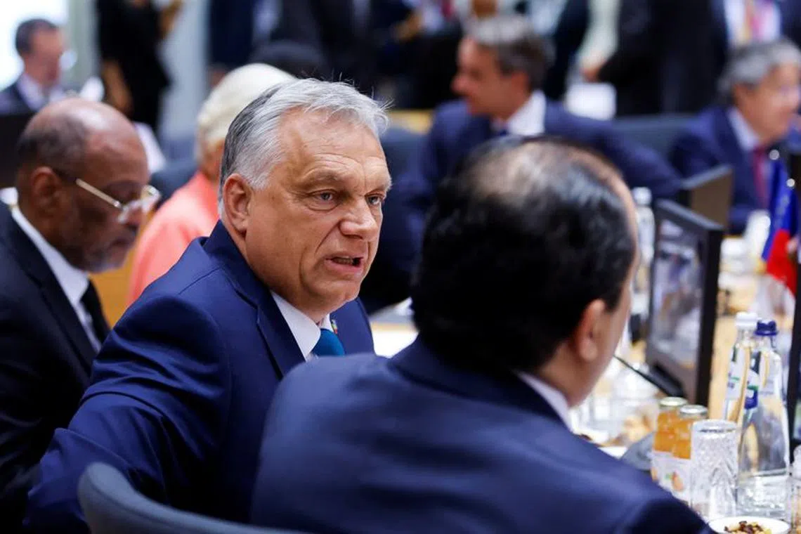 FILE PHOTO: Hungarian Prime Minister Victor Orban attends a roundtable during the summit between leaders of the European Union (EU) and the Community of Latin American and Caribbean States (CELAC), in Brussels, Belgium July 17, 2023. REUTERS/Johanna Geron