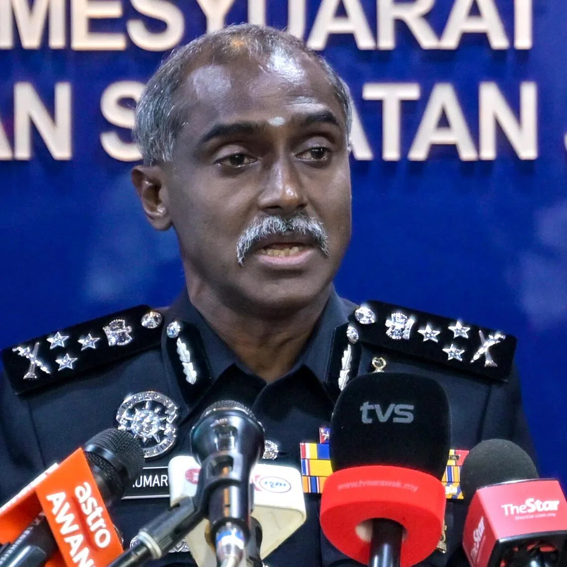 Bukit Aman Criminal Investigation Department Director M. Kumar speaking at a press conference in August.