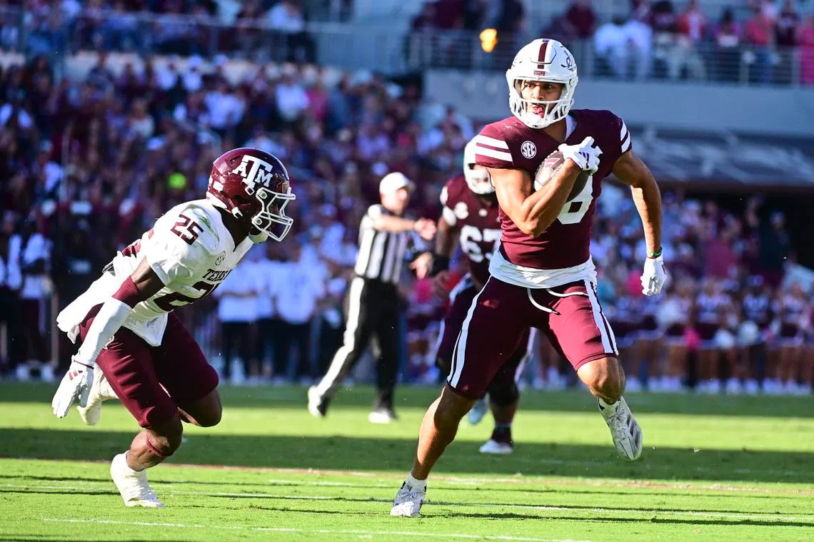 Oct 19, 2024; Starkville, Mississippi, USA; Mississippi State Bulldogs tight end Seydou Traore (18) runs the ball after a reception against Texas A&M Aggies defensive back Dalton Brooks (25) during the second quarter at Davis Wade Stadium at Scott Field. Mandatory Credit: Matt Bush-Imagn Images