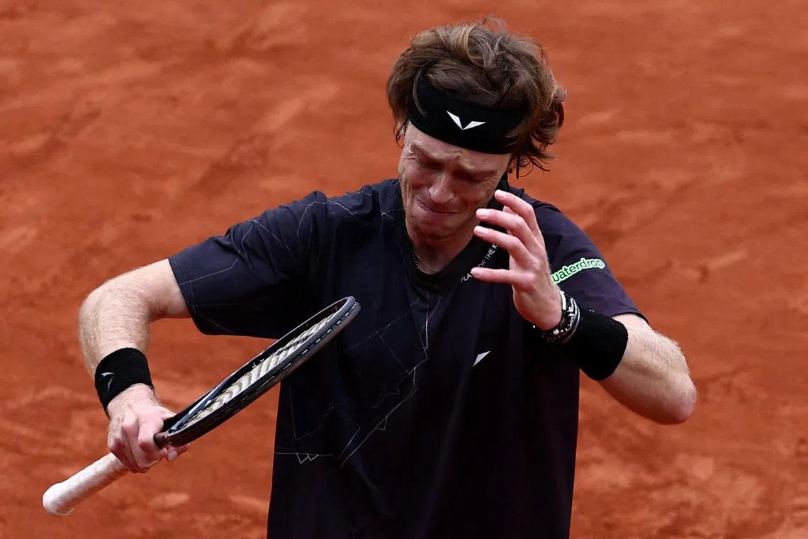 Russia's Andrey Rublev reacts during a frustrating French Open third-round match against Italy's Matteo Arnaldi.