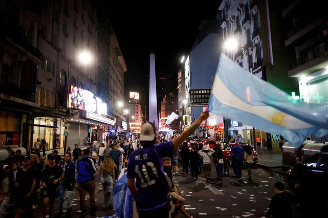 Argentine president-elect Javier Milei's supporters celebrate after Milei wins the runoff presidential election, in Buenos Aires, Argentina November 19, 2023. REUTERS/Adriano Machado