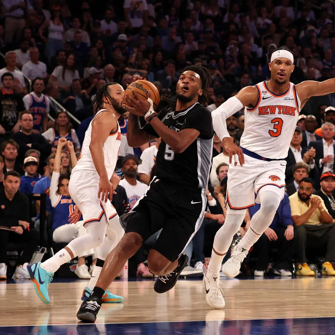 Jun 8, 2026; New York, New York, USA; San Antonio Spurs guard Stephon Castle (5) drives to the basket against New York Knicks guard Josh Hart (3) during game three of the 2026 NBA Finals in the third quarter at Madison Square Garden. Mandatory Credit: Geoff Burke-Imagn Images