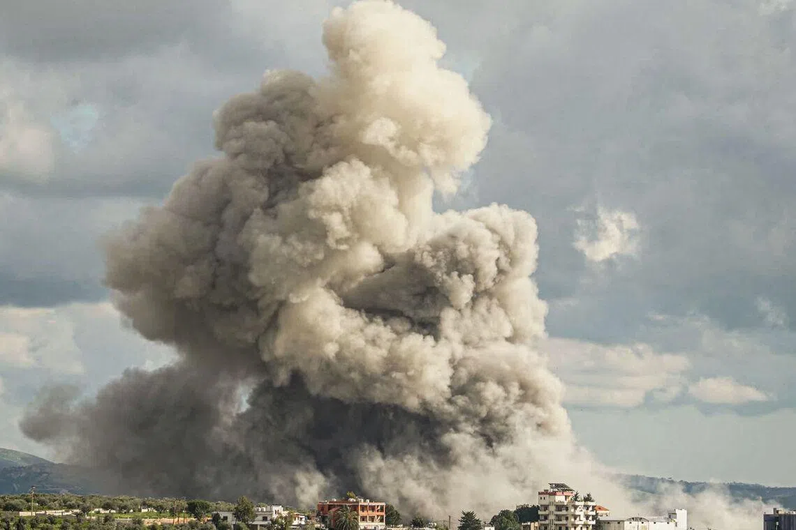 TOPSHOT - Smoke rises from the site of an Israeli airstrike that targeted an area in the southern Lebanese city of Nabatieh on April 12, 2026. Lebanon's health ministry said the death toll since the start of the war between Israel and Iran-backed Hezbollah is now 2,020. The new toll from the Lebanese health ministry includes 248 women, 165 children and 85 medical and emergency personnel killed, along with 6,436 people wounded since Lebanon was drawn into the Middle East war on March 2. (Photo by Abbas Fakih / AFP)