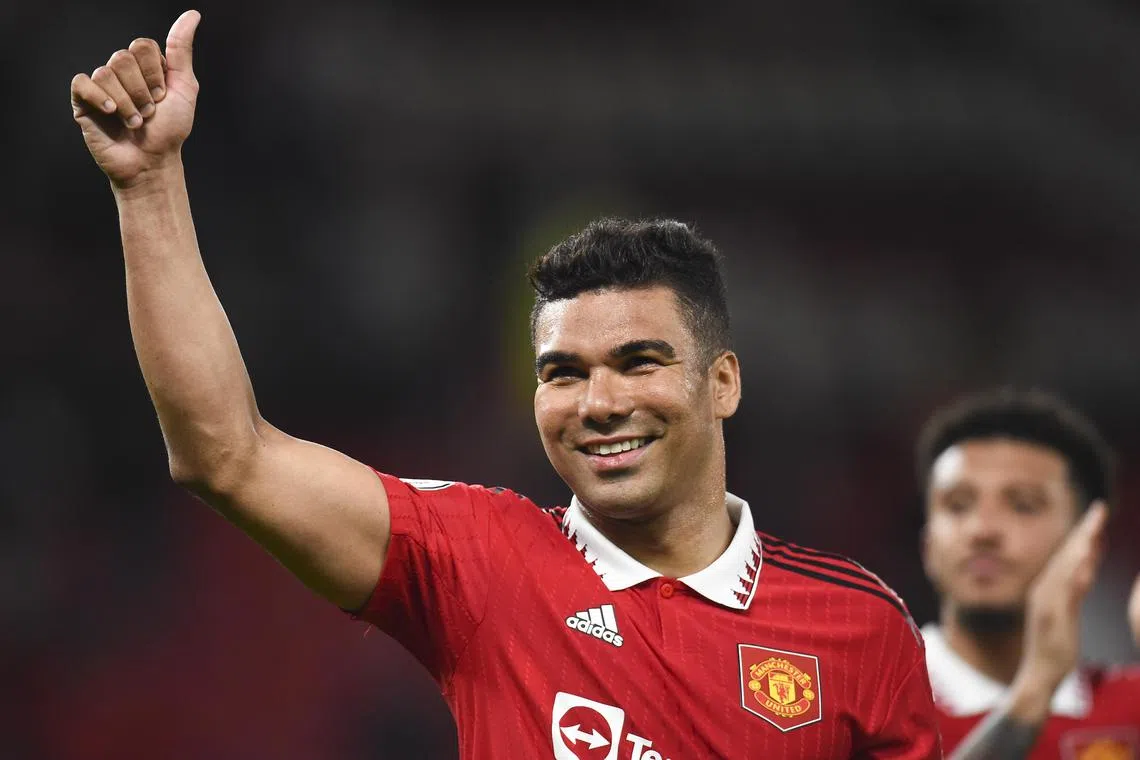 Casemiro celebrates at the end of the match, after Manchester United beat Chelsea to go third in the Premier League.