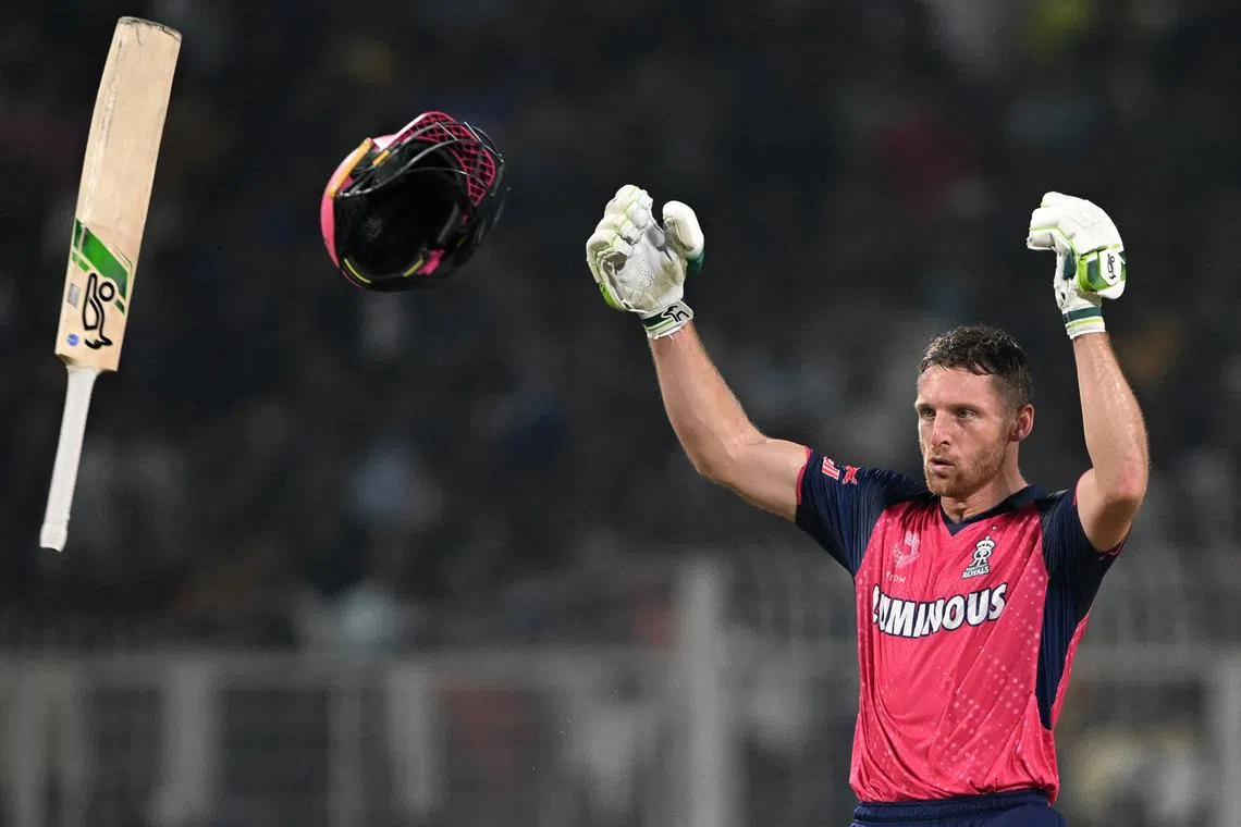 Rajasthan Royals' Jos Buttler celebrating after winning the Indian Premier League Twenty20 cricket match between Kolkata Knight Riders and Rajasthan Royals at the Eden Gardens in Kolkata, on April 16, 2024.