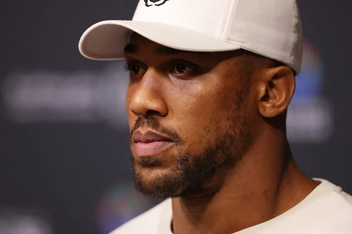 Boxing - Daniel Dubois v Anthony Joshua - IBF World Heavyweight Title - Wembley Stadium, London, Britain - September 22, 2024 Anthony Joshua during the press conference after losing his fight against Daniel Dubois Action Images via Reuters/Andrew Boyers