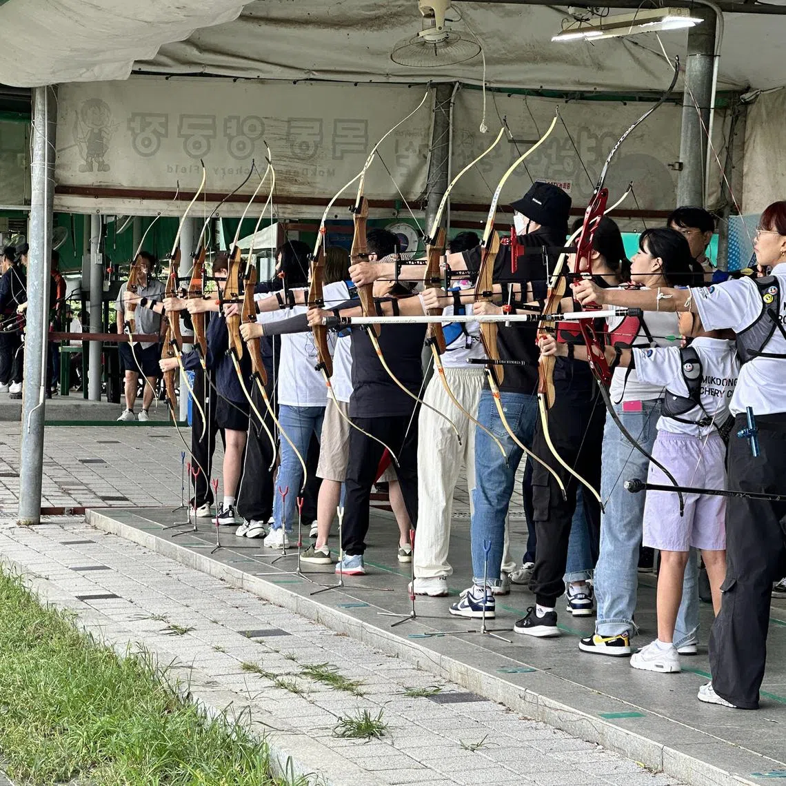 wtarcher - Practitioners at the Mokdong Archery Club on a Saturday morning.


ST PHOTO: WENDY TEO